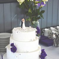 Purple roses wedding cake