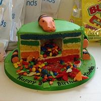 Rainbow snake cake with M&M centre