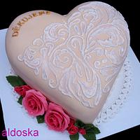 Brush embroidery on heart cake
