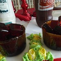 Rum and Coke bottles cake with sugar glass and ice cubes