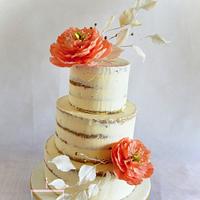 Semi naked wedding cake with sugar flowers