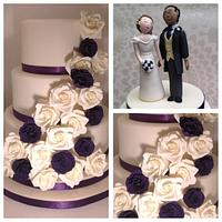 Cream and purple wedding cake
