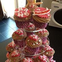 Hot and pale pink 18th birthday cupcake tower