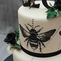 Moth tattoo cake