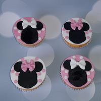 Minnie mouse cake and Cupcakes.