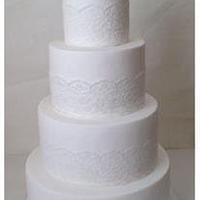white 4 tier lace with sugar magnolia flower