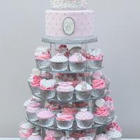 Pretty pink cake and cupcakes 
