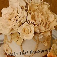 cream and gold wedding cake