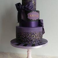Leopard print in purple, gold and black