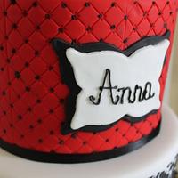 Red, black and white birthday cake