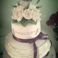 handmade heather 80th birthday cake with frills and roses