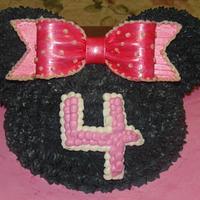 Minnie Mouse hat birthday cake in buttercream