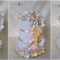 White & gold wedding cake