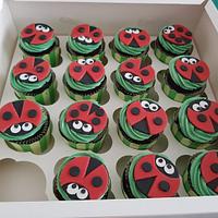 Ladybug birthday cake with cupcakes