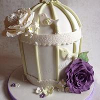Birdcage and roses