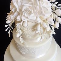 Creamy white stenciled wedding cake