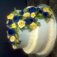 Blue and yellow roses cake
