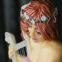 Angel playing harp