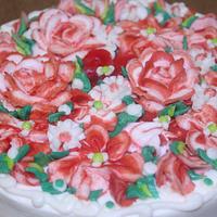Red and white buttercream flower cake