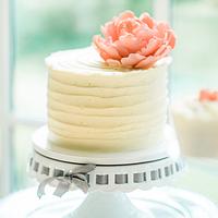 Ivory and peach wedding cake
