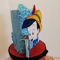 Torta Pinocchio... Dipinto su pasta a di zucchero 
