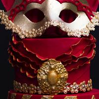 The golden venetian mask in Rosso