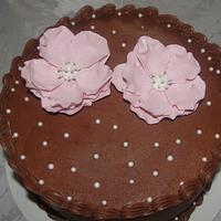 Open rose topper on Chocolate cake