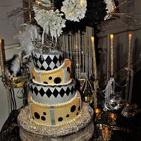 Topsy Turvy gold,silver, black birthday cake