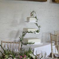 Simple olive leaf wedding cake