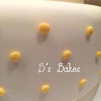 Two teir yellow bow cake