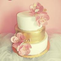 Gold pink wedding cake