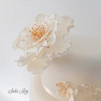 Gold and Ivory ruffle flowers wedding cake 