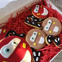 Cars cake with cookies and cupcakes 