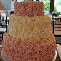 Buttercream rosettes Wedding Cake - cake by Debashree - CakesDecor