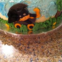 Superhero baby shower cake