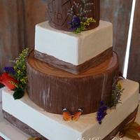 Rustic tree stump wedding cake
