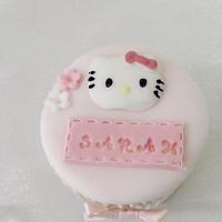 Hello Kitty 2 tier birthday cake and matching cupcakes