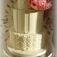 Peony and daisy wedding cake