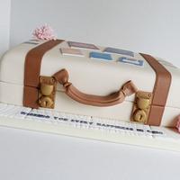 Bon Voyage to Ohio suitcase luggage cake