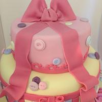 Buttons and bows pretty pastels cake!