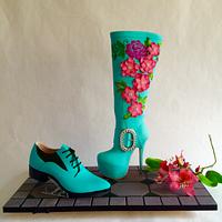 Teal colored high heel boot