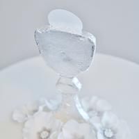 White & silver girl's First Holy Communion cake