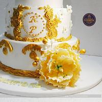 Golden glittered wedding cake