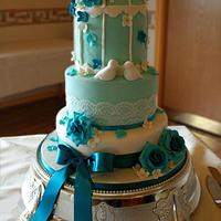 Teal & white birdcage wedding cake