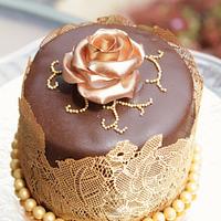 Decadent gold and chocolate mini cake