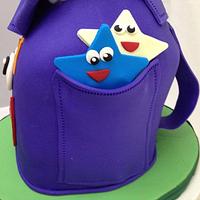 Dora the Explorer backpack cake