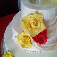 roses and drapes wedding cake