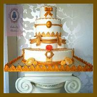 Gold & white wedding cake