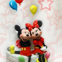Mickey and Minnie with balloon