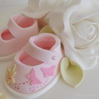 Booties, bows and roses